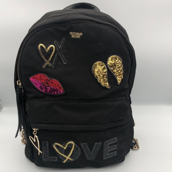 Victoria's Secret Handbags - Victoria's Secret Black Backpack with Gold Embellishments Hearts & Wings